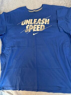 Nike Men’s Royal Blue “Unleash Speed” Short Sleeve Tee